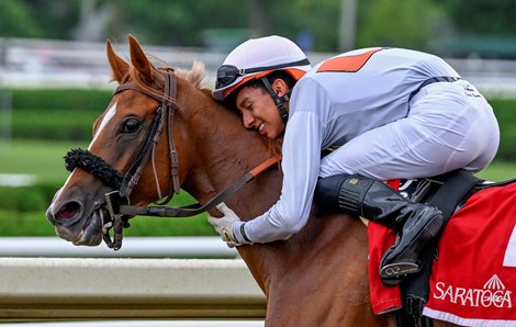 Jockey Jose Gomez shows his appreciation and jubilation to his horse Golden Rocket after winning the 20th running of The New York Stallion Series “Statue of Liberty Division at the Saratoga Race Course Wednesday Aug, 17 2022 in Saratoga Springs N.Y. Jockey Jose Gomez shows his appreciation and jubilation to his horse Golden Rocket after winning the 20th running of The New York Stallion Series “Statue of Liberty Division at the Saratoga Race Course Wednesday Aug, 17 2022 in Saratoga Springs N.Y.