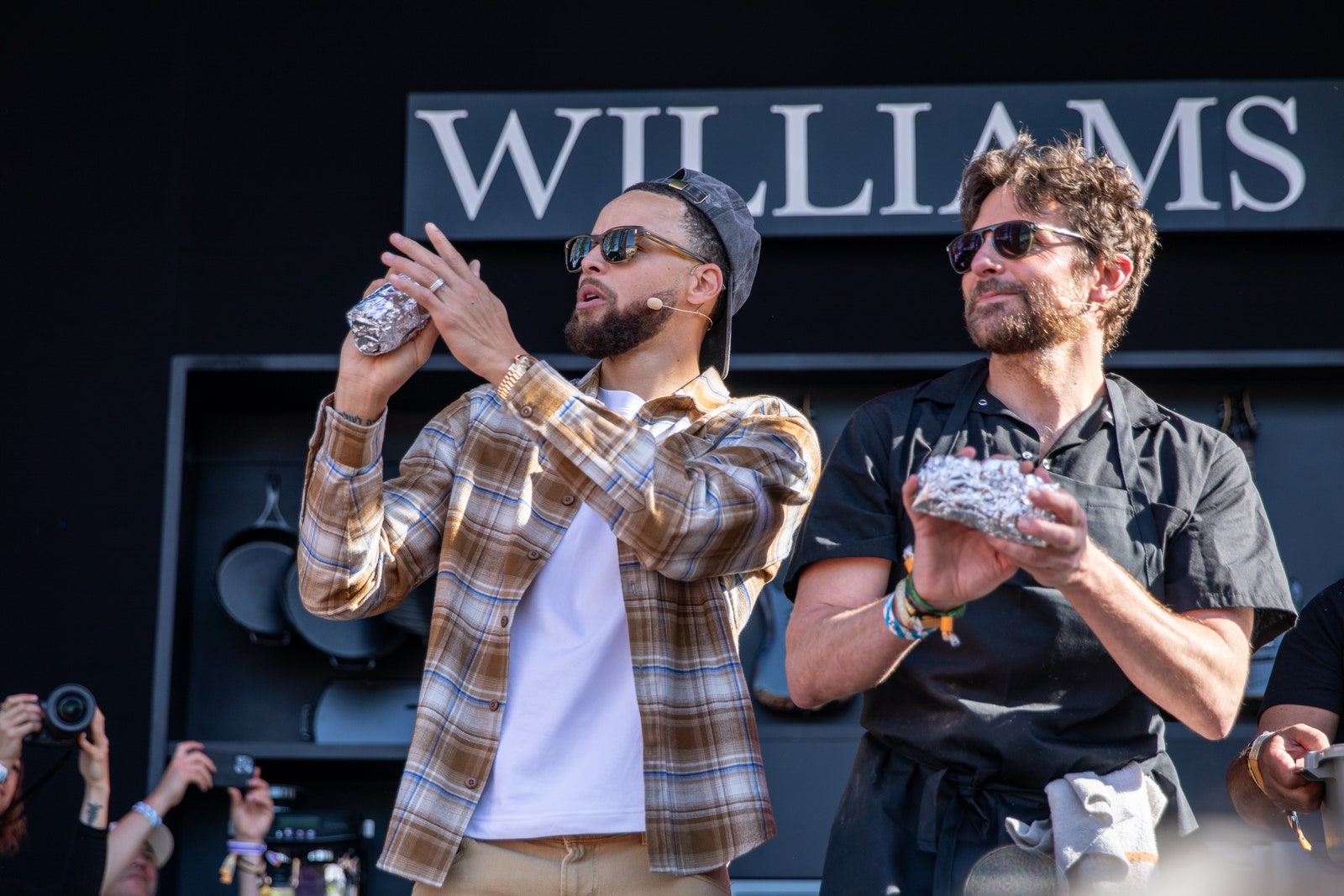 Image may contain Accessories Glasses Adult People Camera Electronics People Baseball Hat Hat Clothes and hats