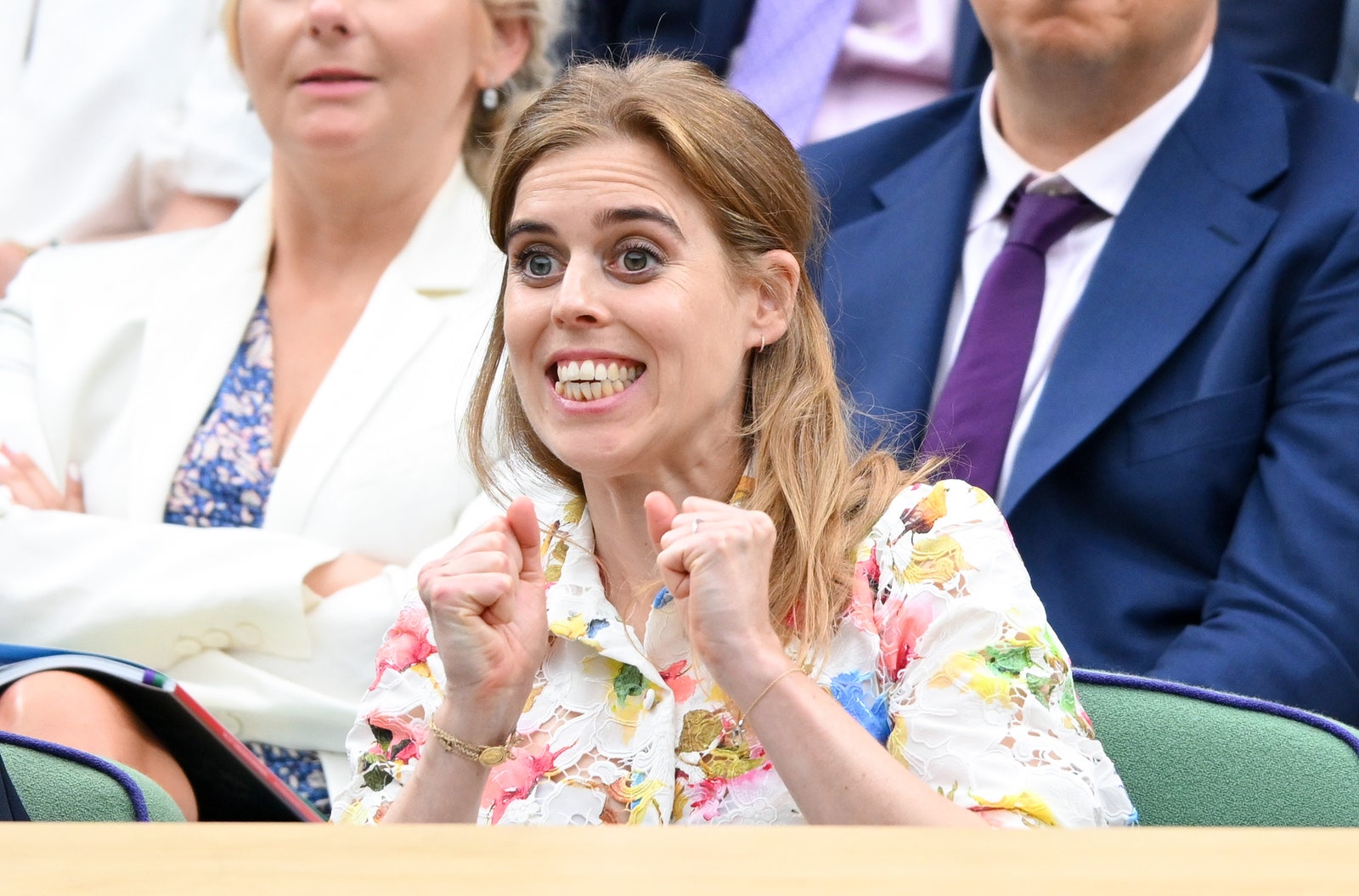 Image may contain Head Face Happy Smile Accessories Formal Wear Tie Adult Wedding Laughing and Chair