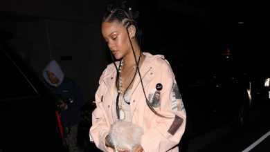 Rihanna Wears A$AP Rocky's Necklace With Her Raf Simons Coat