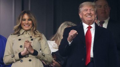Former President Donald Trump and former first lady Melania Trump look on prior to Game Four on October 30 in Atlanta.