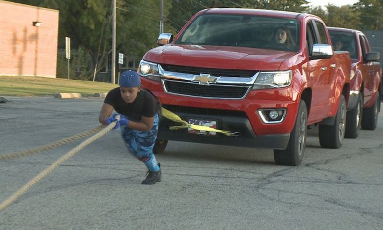 Topeka 10-year-old weightlifter pulls two pickup trucks