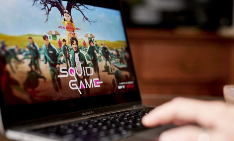The Netflix Inc. television series 'Squid Game' on a laptop computer arranged in the Brooklyn Borough of New York, U.S., on Saturday, Oct. 16, 2021. Netflix Inc. is scheduled to release earnings figures on October 19. Photographer: Gabby Jones/Bloomberg via Getty Images