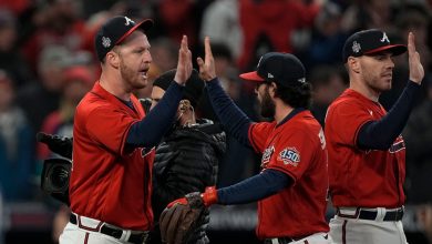 Atlanta Braves celebrate their win in Game 3 of baseball's World Series between the Houston Astros and the Atlanta Braves Friday, Oct. 29, 2021, in Atlanta. The Braves won 2-0, to lead the series 2-1games.(AP Photo/Brynn Anderson)