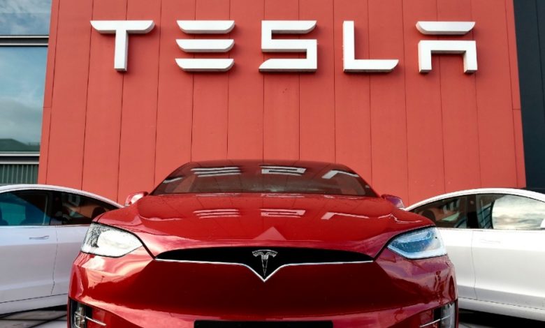 Tesla just became the sixth company in U.S. history to be worth $1 trillion. (John Thys/AFP/Getty Images)