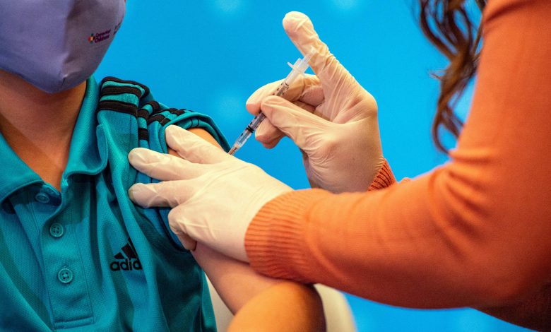 CDC director urges kids who've had a prior Covid infection to still get vaccinated