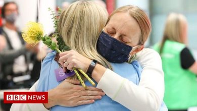 Covid: Emotional reunions as Australia's border reopens