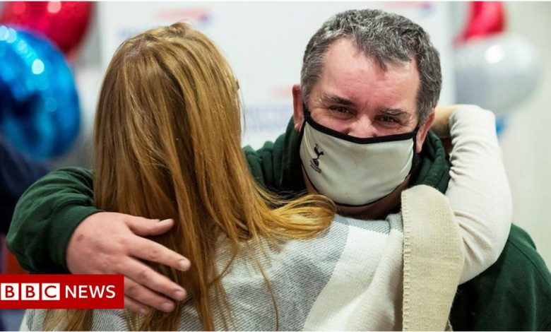 Emotional families reunite at airport as US lifts travel ban