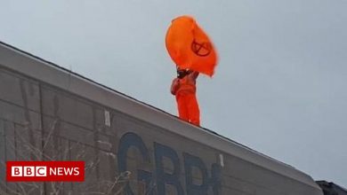 Protester climbs on top of train to Drax power station