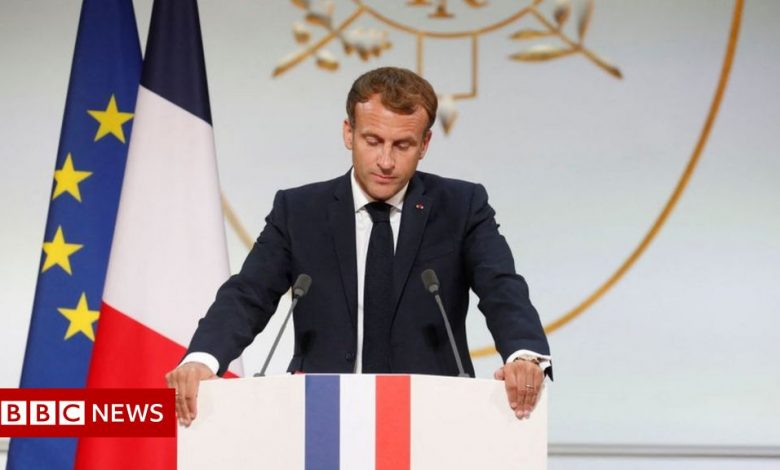 Macron switches to using navy blue on France's flag - reports