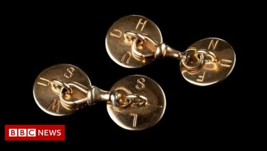 Ian Fleming's cufflinks with mysterious codes sold at auction