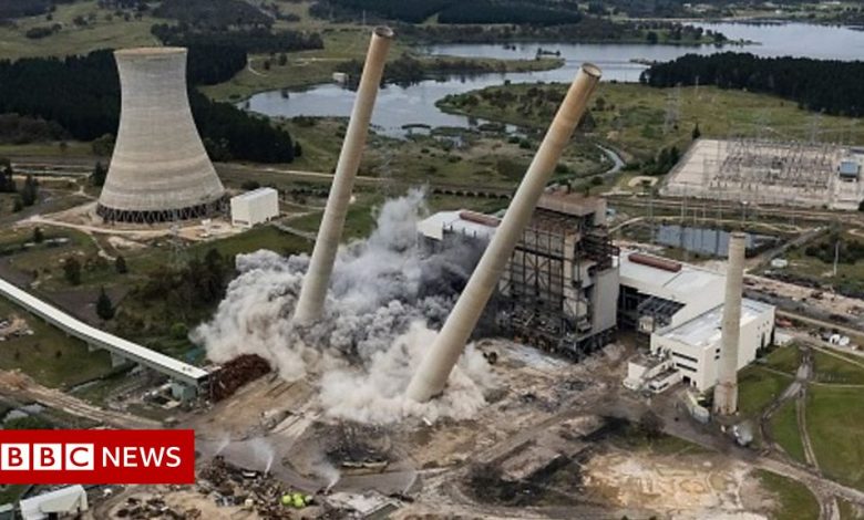 Demolition of a power plant in Australia saw giant chimneys fall to the ground