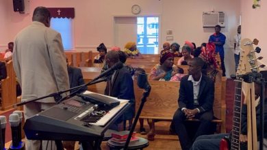 Congregation members at Nashville Light Mission Pentecostal Church after a man with a gun disrupted their service Sunday, Nov. 7, 2021. The pastor, Ezekiel Ndikumana, tackled the man and other church members held him while police responded.