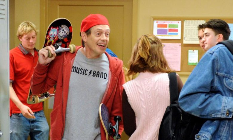 Steve Buscemi dressed as his own 'How do you do, fellow kids?' meme to give out Halloween candy