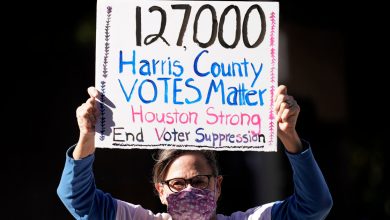 Justice Department sues Texas over restrictive voting law