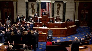 Cheers on House floor after Joe Biden's infrastructure bill passes