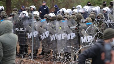 Crisis worsens on Poland-Belarus border as migrants congregate and troops are mobilized