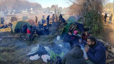 EU accuses Belarus of acting like 'gangster regime' as thousands of freezing migrants camp on Polish border