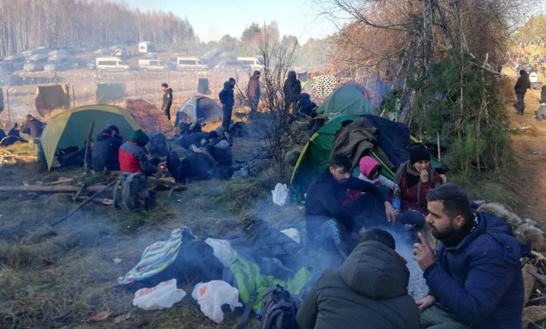 EU accuses Belarus of acting like 'gangster regime' as thousands of freezing migrants camp on Polish border