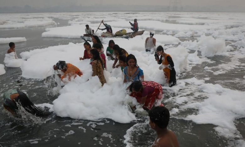 India's Yamuna River coated in toxic foam as Hindu devotees gather for Chhath Puja festival