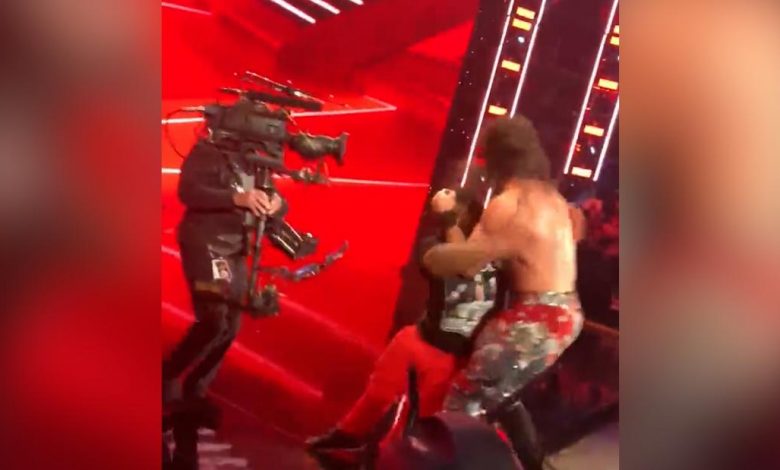Watch WWE wrestlers get a surprise attack on a live broadcast