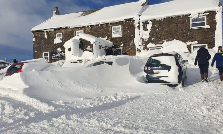 Dozens of strangers were dumped in the snow at a UK pub.  Cue the Oasis singalongs: NPR