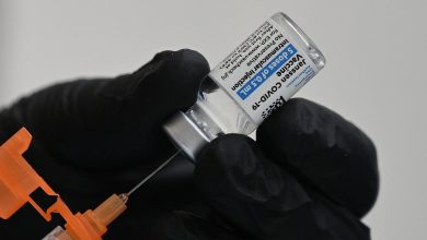 A nurse fills a syringe with Johnson & Johnson's Janssen Covid-19 vaccine on August 19, in Pasadena, California.