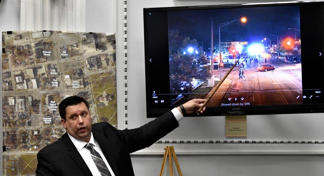 James Armstrong of the State Crime Lab points to drone video he digitally enlarged during Kyle Rittenhouse's trial at the Kenosha County Courthouse on Nov. 9, 2021, in Kenosha, Wisconsin.