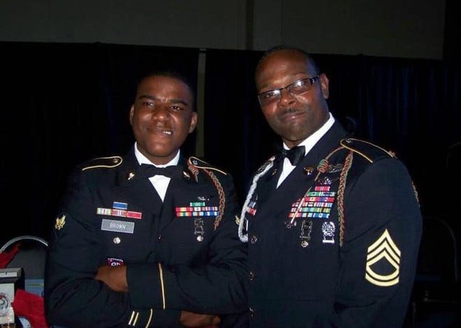 Shawn Brown on the left with SFC Xavier Noel at a military ball after returning from Afghanistan.