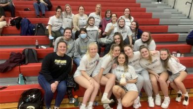 Team rallies around hospitalized assistant coach
