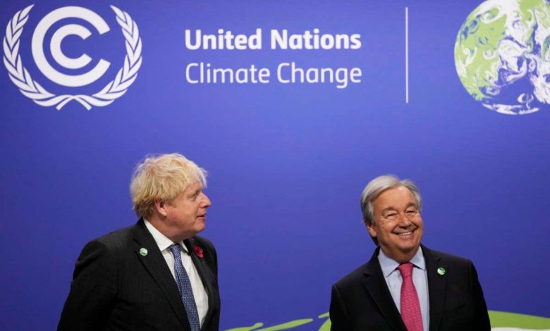 Mandatory Credit: Photo by Alastair Grant/AP/Shutterstock (12581861d) British Prime Minister Boris Johnson, speaks with United Nations Secretary General Antonio Guterres during arrivals at the COP26 U.N. Climate Summit in Glasgow, Scotland, . The U.N. climate summit in Glasgow gathers leaders from around the world, in Scotland's biggest city, to lay out their vision for addressing the common challenge of global warming Climate COP26 Summit, Glasgow, United Kingdom - 01 Nov 2021