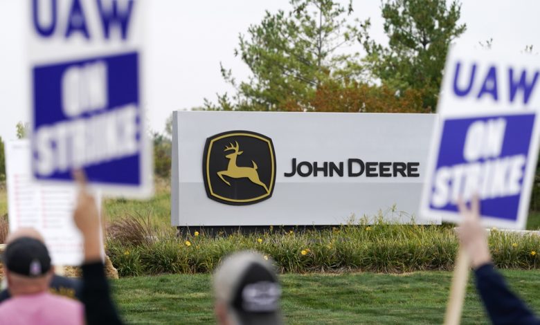 Deere & Co workers.  accept the latest contract offer and will end their strike: NPR