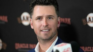 San Francisco Giants catcher Buster Posey talks during a news conference announcing his retirement from baseball, Nov. 4, 2021, in San Francisco. (AP Photo/Tony Avelar)