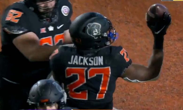 Dezmon Jackson scores his second rushing touchdown as Oklahoma State steamrolls TCU, 49-3