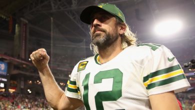 NFL denies telling Aaron Rodgers vaccinated people couldn't get or spread COVID : NPR