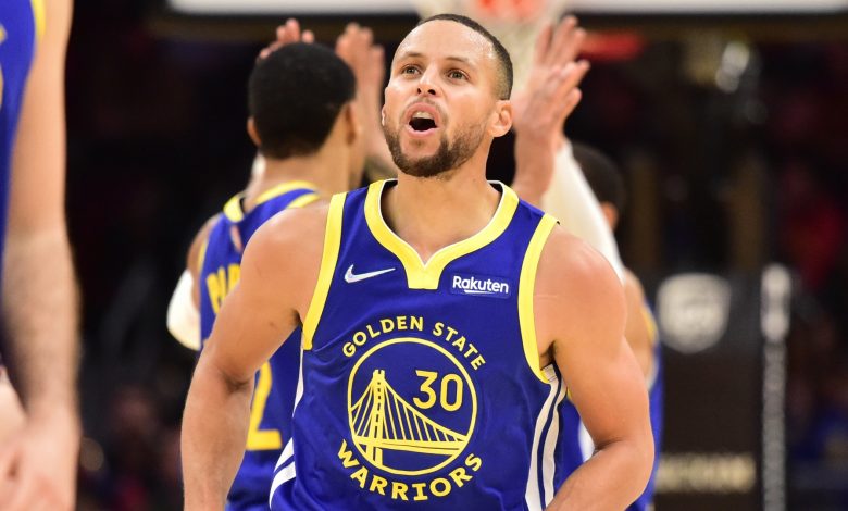 The Warriors' Stephen Curry is breaking through the defense before he touches the ball