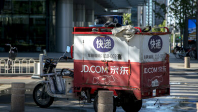 JD.com rises after Tencent says it will split most of its shares among shareholders