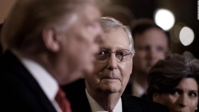 US President Donald Trump (L) talks to the press as Senate Majority Leader Mitch McConnell (R-KY) looks on after the Republican luncheon at the U.S. Capitol Building on January 9, 2019 in Washington, DC.