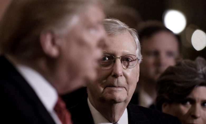 US President Donald Trump (L) talks to the press as Senate Majority Leader Mitch McConnell (R-KY) looks on after the Republican luncheon at the U.S. Capitol Building on January 9, 2019 in Washington, DC.