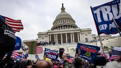 DOJ charges 2 accused of marching with Proud Boys and leader in charge at US Capitol