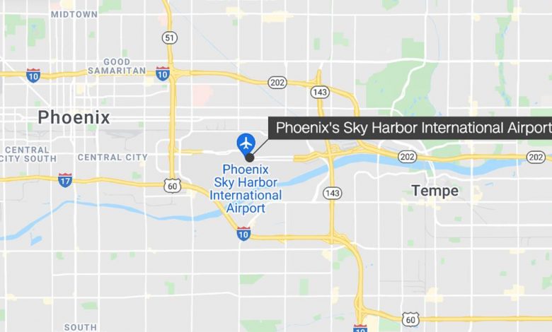A man jumps out of an airplane taxiing at Phoenix's Sky Harbor International Airport