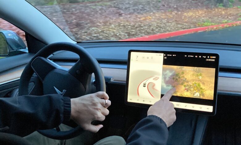 Tesla is being investigated over the driver's ability to play video games