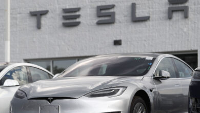 Tesla recalls nearly half a million cars over safety issues: NPR