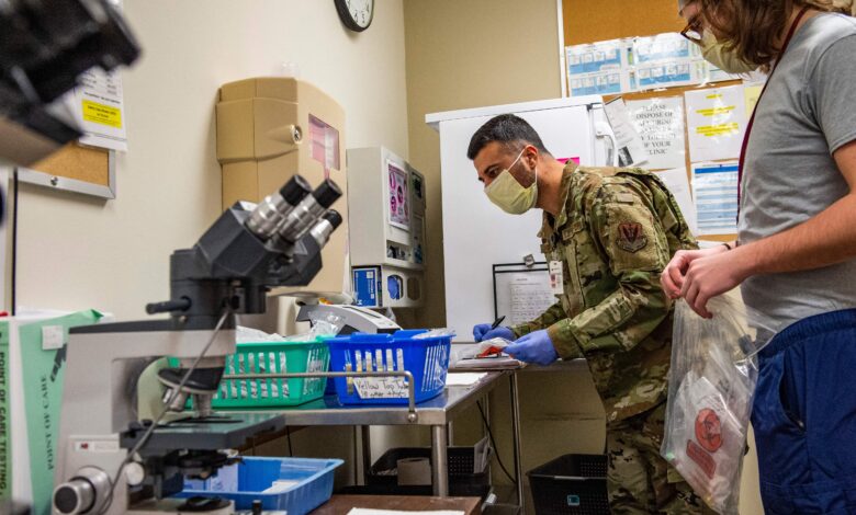 A National Guard airman is trained in hospital procedures at UMass Memorial Medical Center in Worcester, Massachusetts last month. The Massachusetts National Guard activated soldiers and airmen to help address the medical worker shortage. 