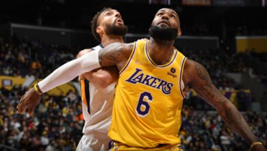 LeBron James, center, leads the Lakers in brief to claim victory over the formidable Jazz
