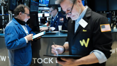 Stock futures drop slightly as investors weigh earnings, Fed and geopolitics