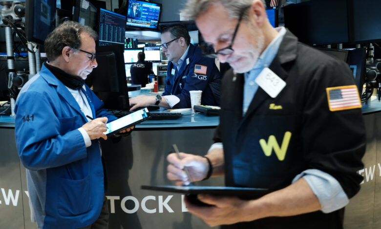 Stock futures drop slightly as investors weigh earnings, Fed and geopolitics