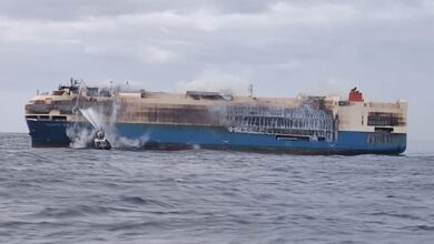 Rescue crews board the burnt-out Felicity Ace off the Azores, towing begins