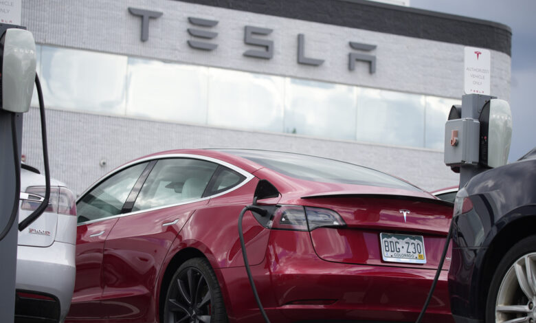 Tesla will disable software that allows cars to pass stop signs: NPR