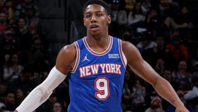 The Knicks guard limps after injuring his left ankle against the Nuggets